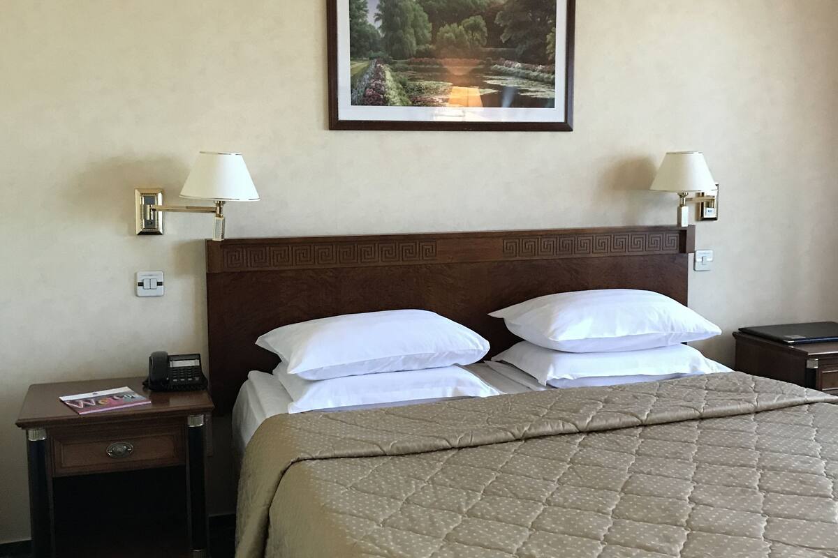 Apartment, 1 King Bed, Non Smoking, City View | Premium bedding, in-room safe, desk, iron/ironing board