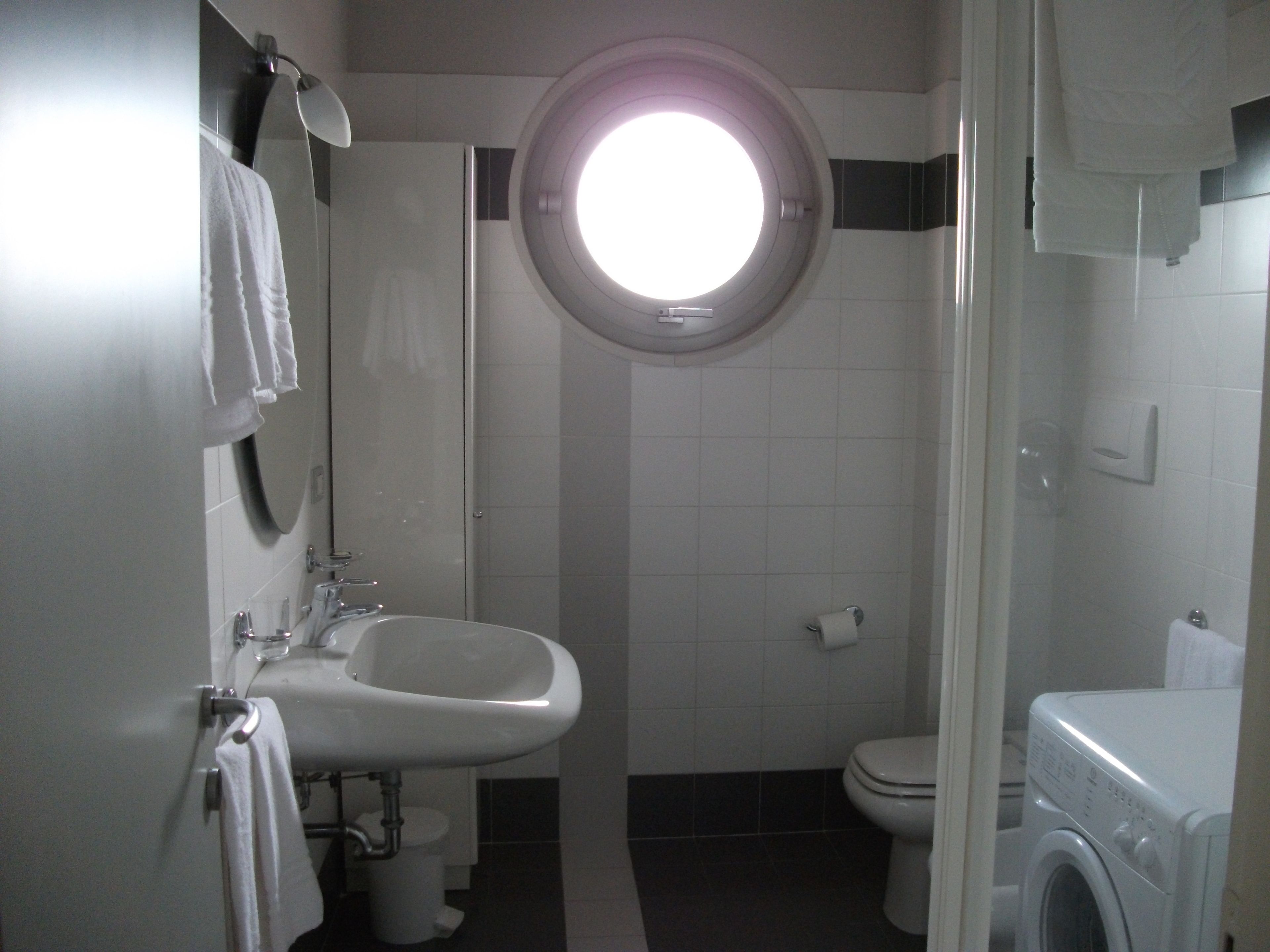 bathroom | shower, hair dryer, bidet, towels