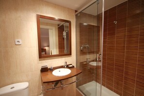 Bathtub, hair dryer, toilet paper