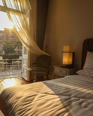 Ropa de cama de alta calidad y minibar . 1920s Boutique Hotel and Restaurants