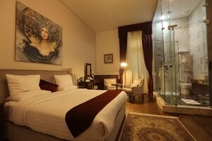 Premium bedding, minibar, in-room safe, blackout drapes