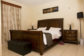 Appartement, vue jardin | Rideaux occultants, lits pliants/supplémentaires, Wi-Fi gratuit