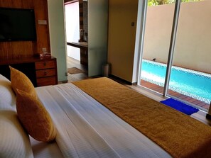 1 多间卧室、高档床上用品、迷你吧、客房内保险箱