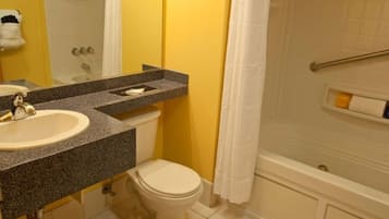 Combined shower/tub, hair dryer, towels, soap