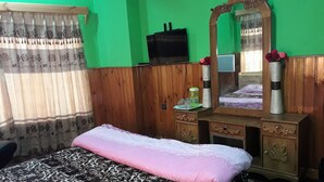 Deluxe Triple Room, 1 King Bed, Smoking, Valley View | Room amenity - Riverside Duplex Guest House (Thimphu)