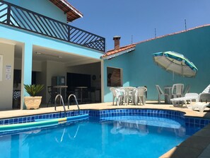 Outdoor pool, open 9:00 AM to 9:00 PM, pool loungers