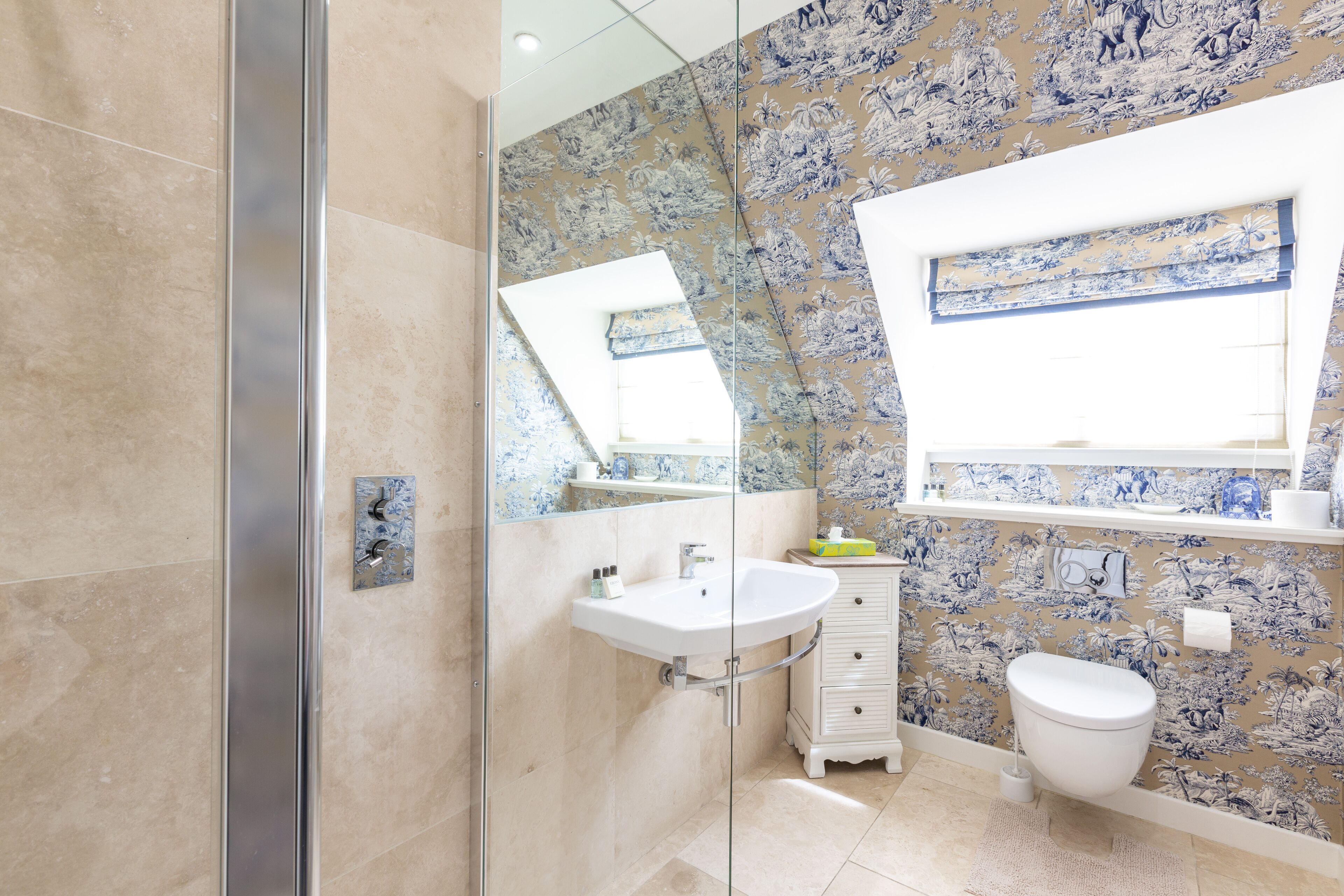 Combined shower/tub, hair dryer, towels, soap