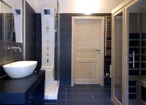 Shower, jetted tub, hair dryer, bidet