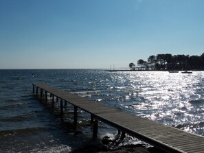 On the beach, sun-loungers