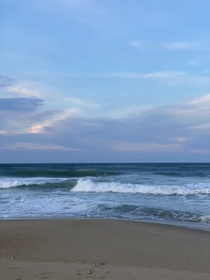 On the beach, sun-loungers