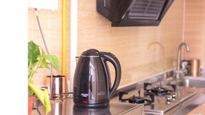 Apartemen | Dapur pribadi | Lemari es, microwave, kompor, dan mesin pencuci piring