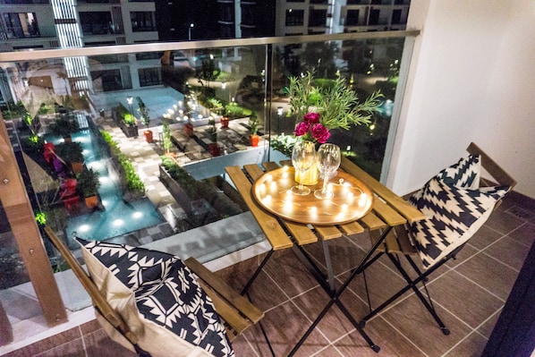 Departamento, 1 cama Queen size, para no fumadores, vista al jardín | Balcón