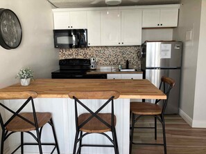 Fridge, microwave, oven, stovetop - Beachfront! Remodeled! Lovers Key Beach Club #103 (Fort Myers Beach)