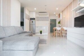 Appartement, 1 chambre | Coin séjour | Télévision à écran plat
