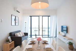 Apartment, 1 Schlafzimmer | Wohnbereich | Flachbildfernseher