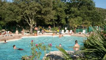 Seasonal outdoor pool, open 9:00 AM to 6:30 PM, pool umbrellas