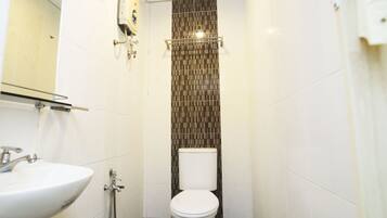 Shower, free toiletries, slippers, towels