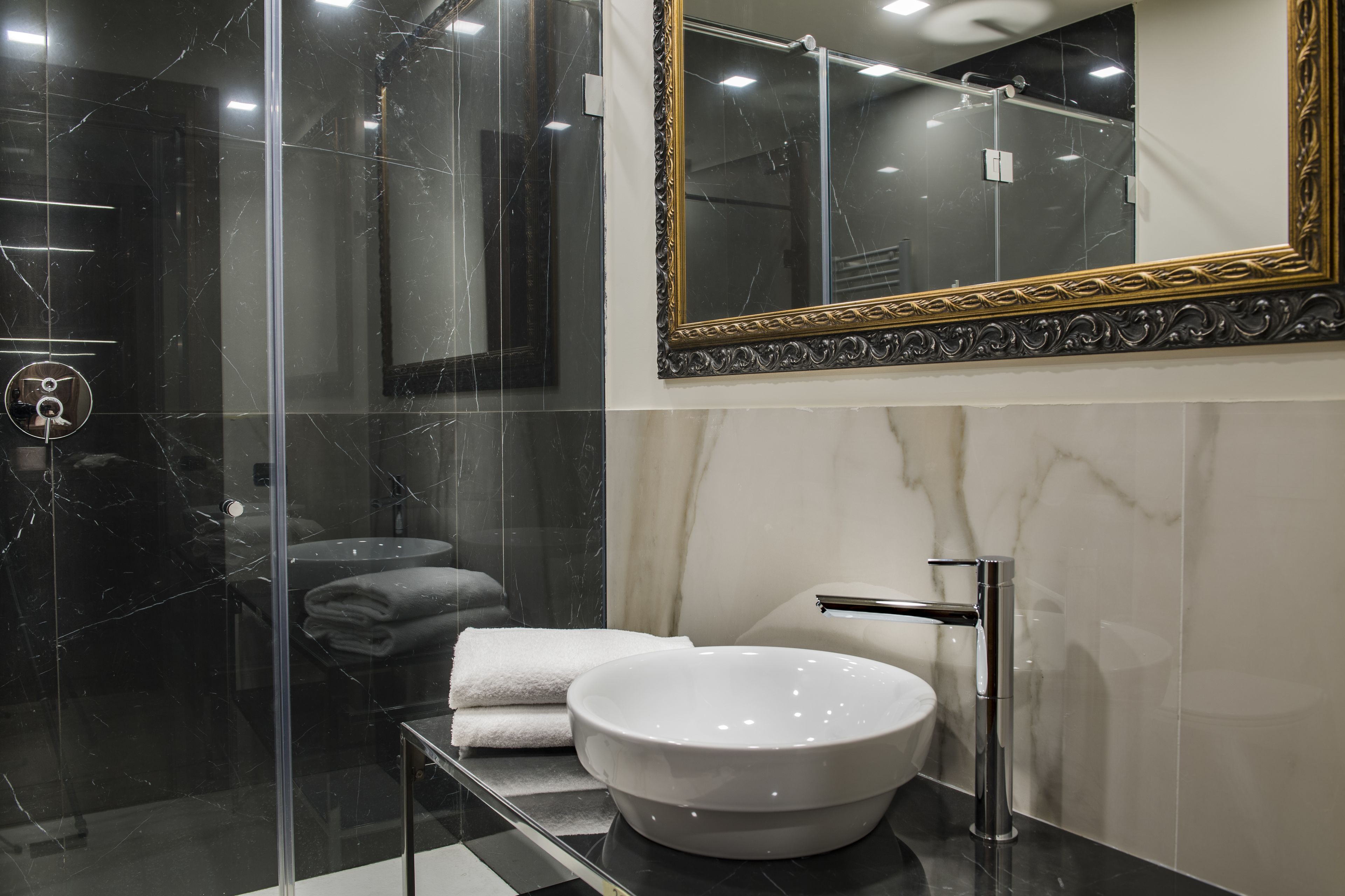 jetted bath, rainfall showerhead, free toiletries, hair dryer