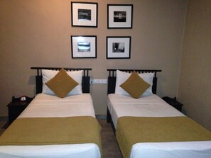 4 bedrooms, blackout drapes, iron/ironing board, rollaway beds