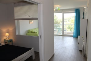 Apartment, 1 Bedroom, Balcony, Sea View | Iron/ironing board, free cribs/infant beds, free WiFi, bed sheets