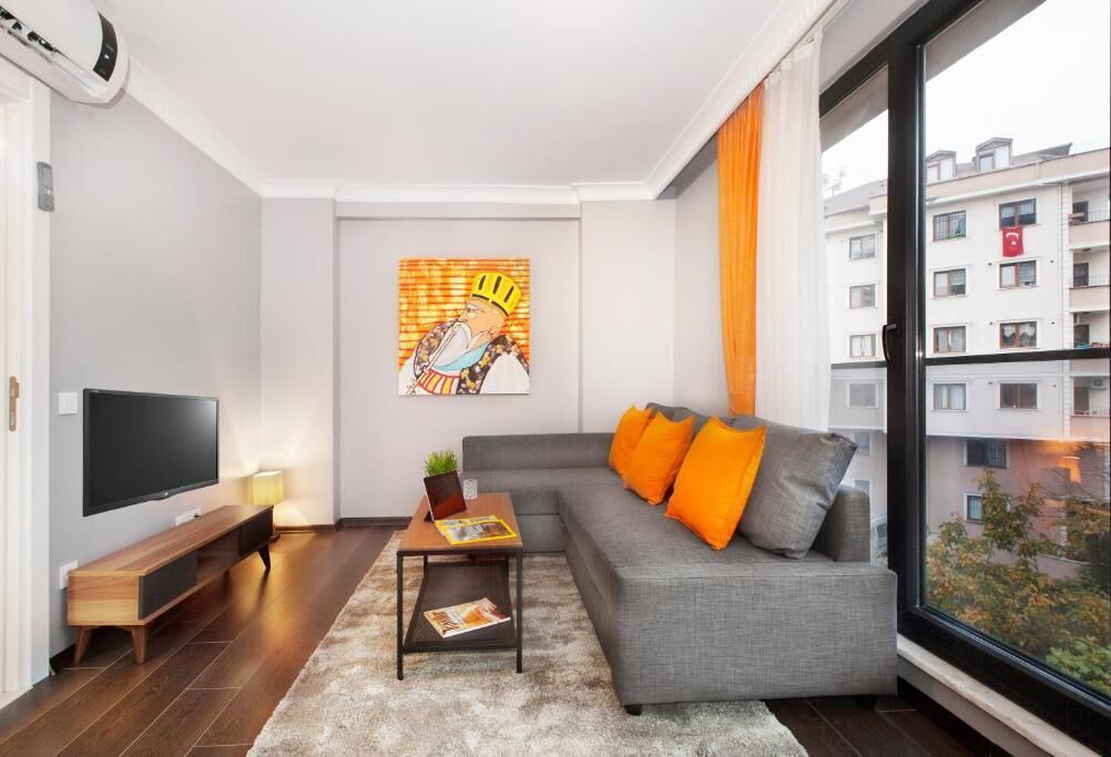 Standard Apartment, 1 Bedroom | Living area | 106-inch LCD TV with satellite channels, TV