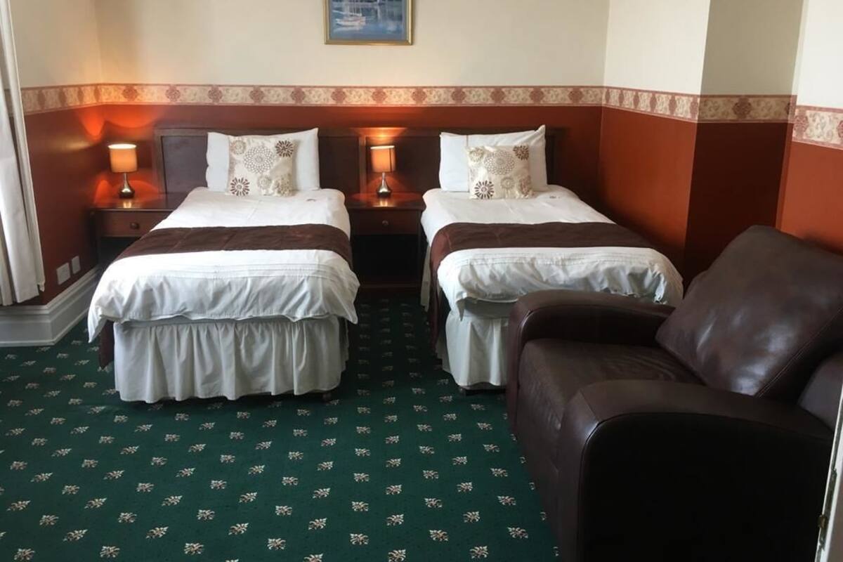 Twin Room | Premium bedding, iron/ironing board (on request), WiFi (free)