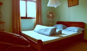Desk, blackout curtains, bed sheets