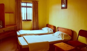 Desk, blackout curtains, bed sheets