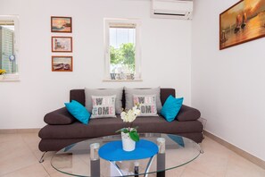 Appartamento | Area soggiorno | TV a schermo piatto