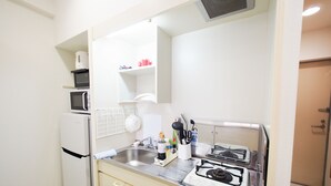 Standard Quadruple Room (PH154) | Private kitchenette | Full-size fridge, microwave, stovetop, cookware/dishes/utensils - Always Stay Dotonbori 2 PH-154 (Osaka)