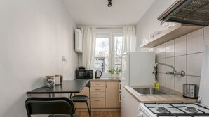 Superior Apartment, 2 Bedrooms | Private kitchenette | Coffee/tea maker, full-sized fridge, microwave, oven - Chill Apartments Downtown (Warsaw)