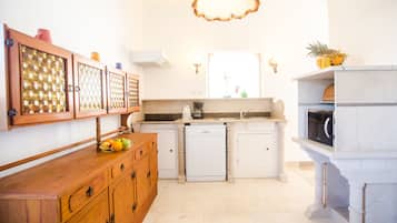 Villa | Private kitchen | Fridge, microwave, stovetop, dishwasher