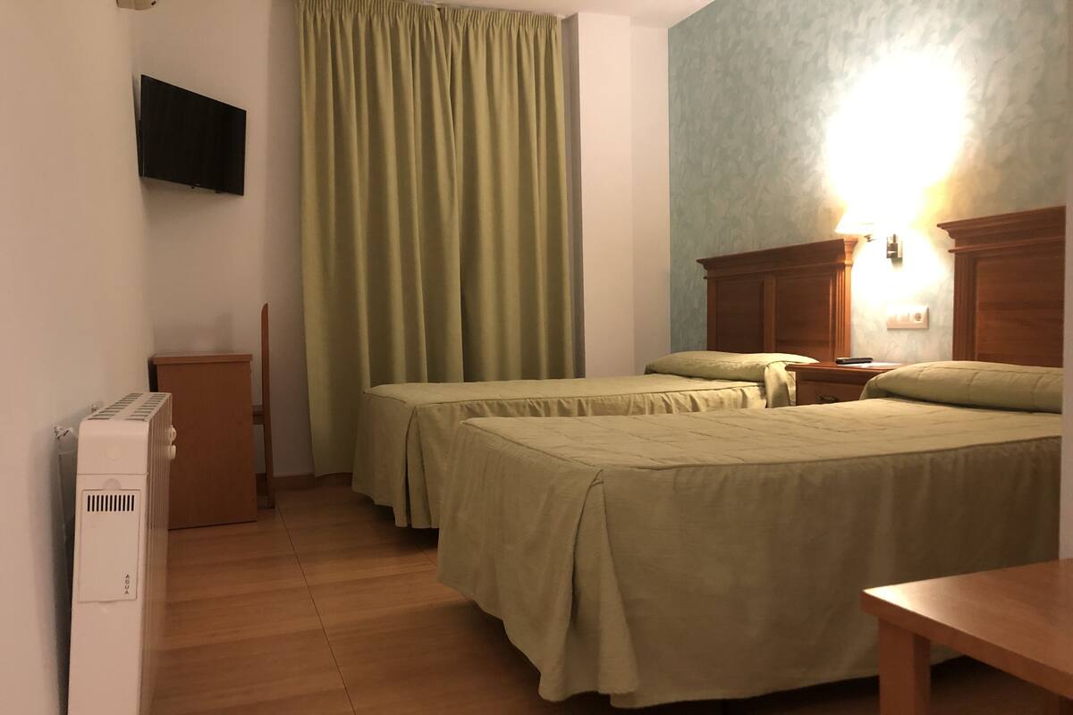 Desk, blackout drapes, rollaway beds, free WiFi