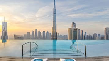 2 outdoor pools, pool umbrellas, pool loungers