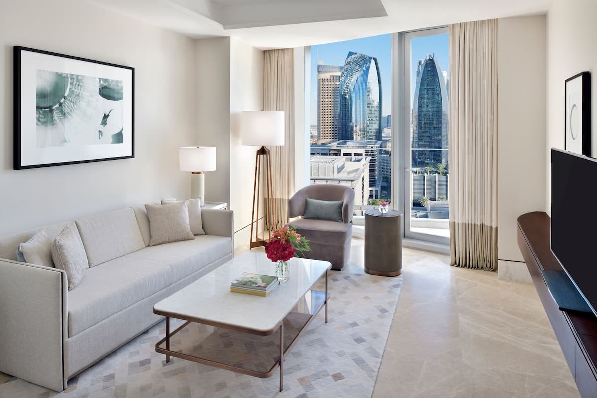 Executive Suite Sky View - Exclusive Access to Level 54 Infinity Pool | Living room | 32-inch LED TV with satellite channels, TV