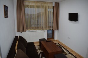 Panoramic Apartment, Balcony, Mountain View | Living area | Flat-screen TV - Mamin Kolio (Bansko)