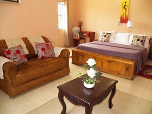 Apartment, Multiple Beds, Non Smoking | Minibar, individually decorated, desk, blackout drapes - TS Lodgings (Accra)