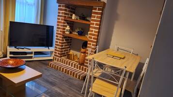 Rumah Ekonomi, kamar mandi pribadi, pemandangan kebun (Contractors | Traders) | Makan di kamar