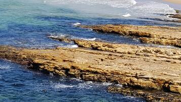 Beach nearby, sun loungers