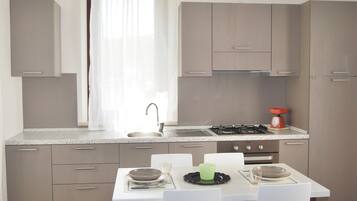 Apartment, 2 Bedrooms (Conero Residence Trilo 4+2) | Private kitchen | Full-size fridge, oven, stovetop, coffee/tea maker