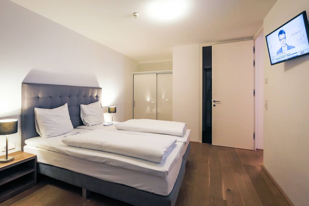 Apartment, 2 Bedrooms, Lake View | Premium bedding, minibar, in-room safe, soundproofing