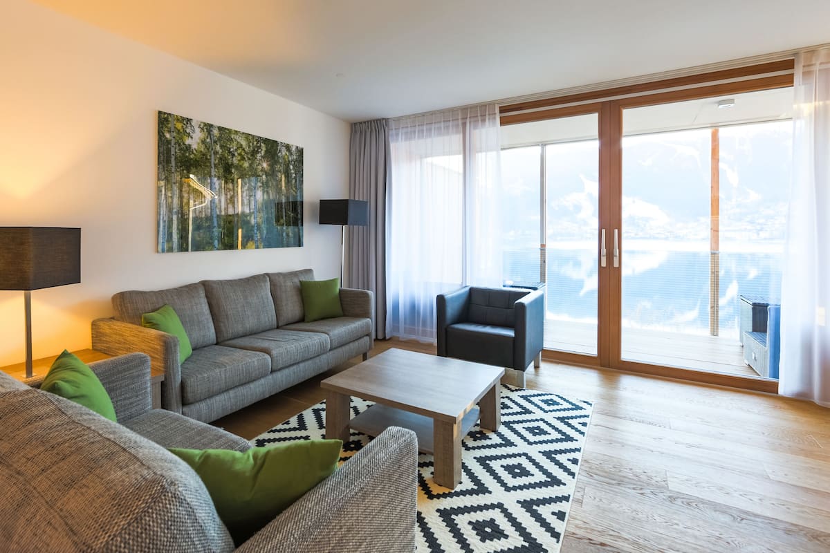 Apartment, 2 Bedrooms, 2 Bathrooms, Lake View | Living area | Flat-screen TV