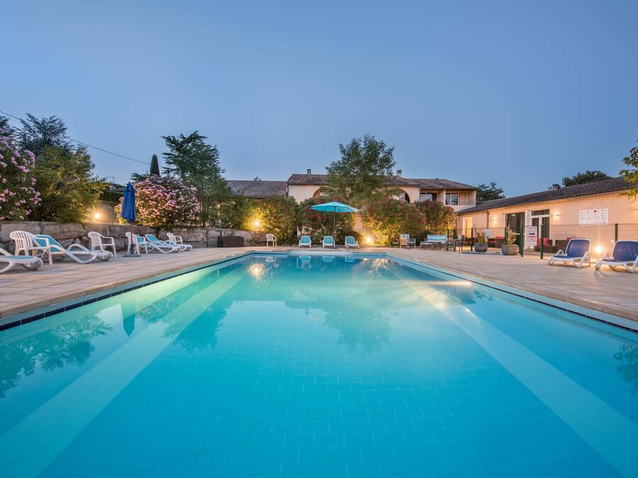 Seasonal outdoor pool, open 10:00 AM to 8:00 PM, pool umbrellas