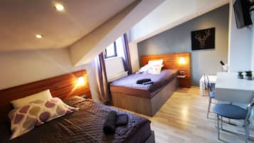 Departamento Confort, varias camas, vista a la ciudad | 1 habitación y espacio para trabajar con laptop