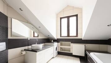 Deluxe Apartment, Multiple Beds, Non Smoking, City View | Bathroom | Free toiletries, hair dryer, towels, soap