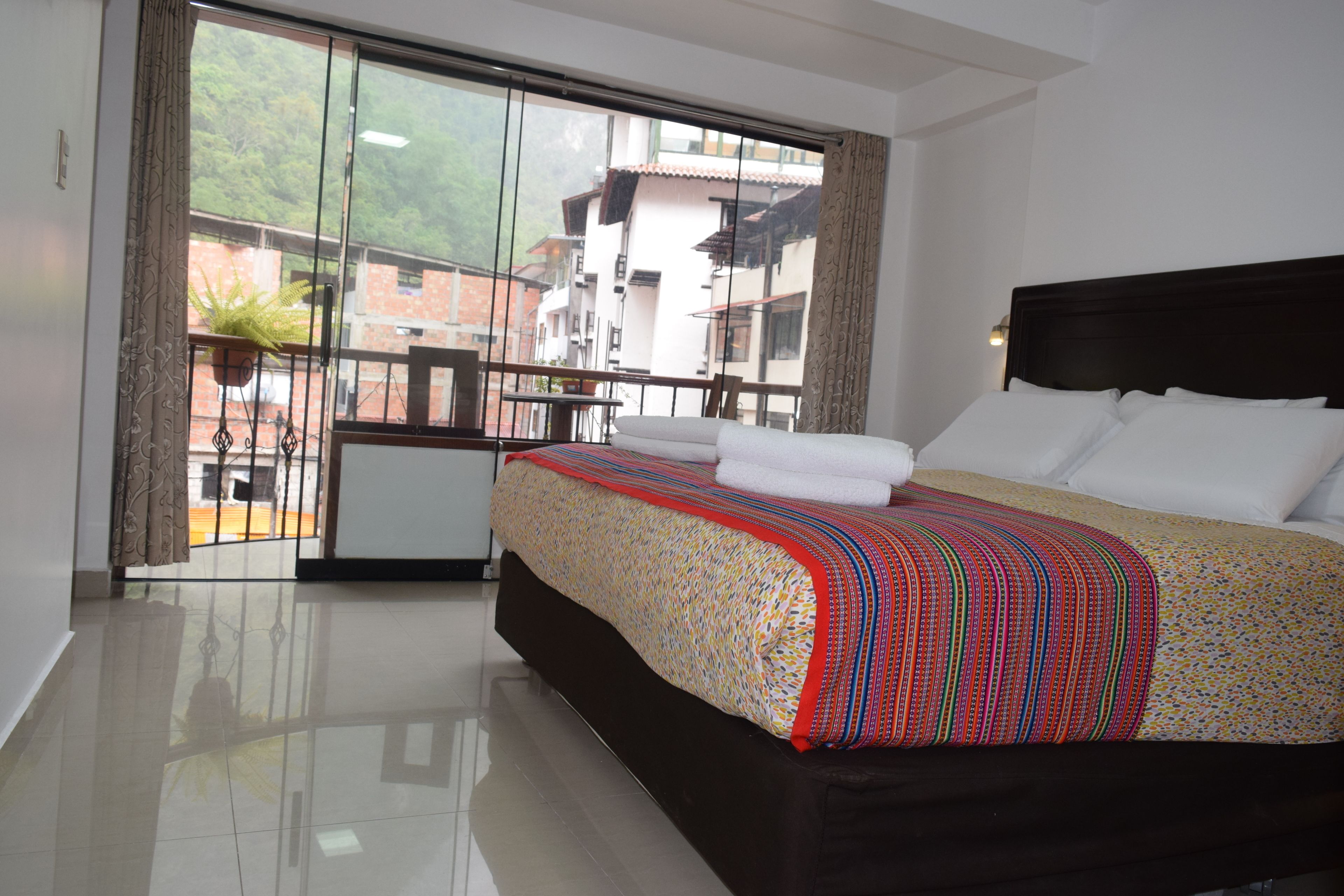 Egyptian cotton sheets, premium bedding, down duvets, iron/ironing board