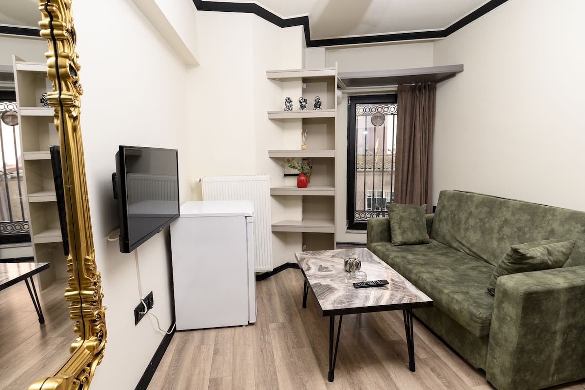Standard Suite | Premium bedding, desk, blackout curtains, soundproofing