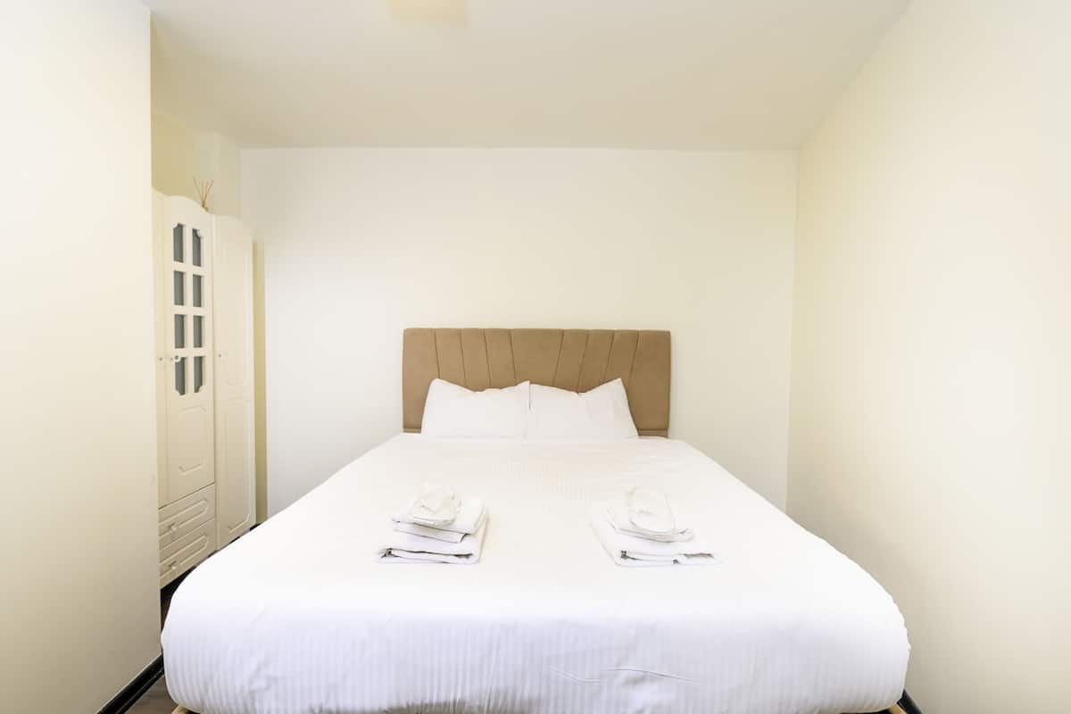 Premium bedding, desk, blackout curtains, soundproofing