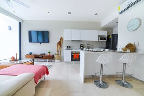 Apartment, 2 Bedrooms, Ocean View | Living area | Flat-screen TV - Menesse 32 - 003 (Playa del Carmen)