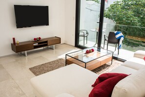 Apartment, 2 Bedrooms, Ocean View | Television - Menesse 32 - 204 (Playa del Carmen)